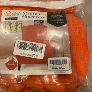 Easy going orange wing chair slip cover